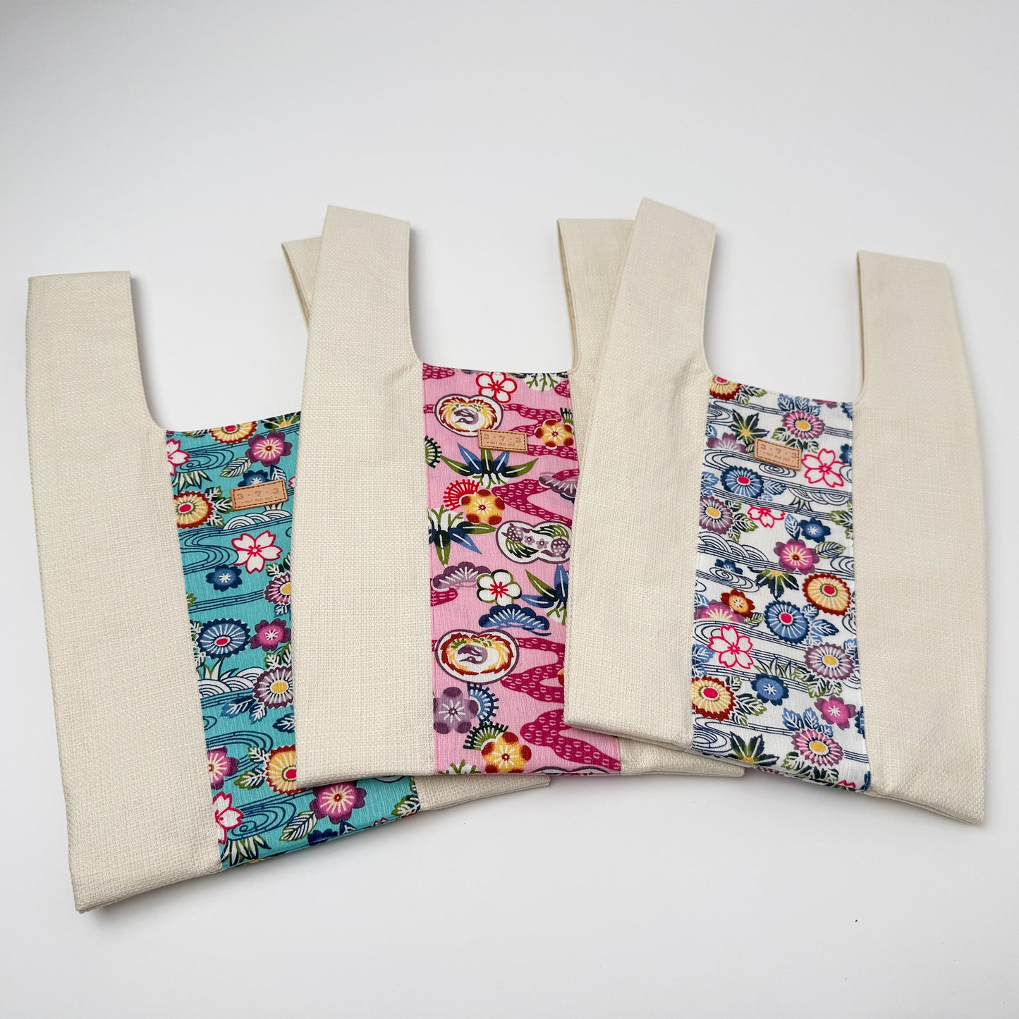 ３・７・３WHITE SPLASH ワンハンドルバッグ